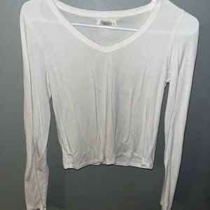 Black and white V-neck longsleeve T-shirt.